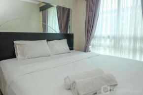Comfort and Elegant 2BR at Woodland Park Residence Apartment By Travelio